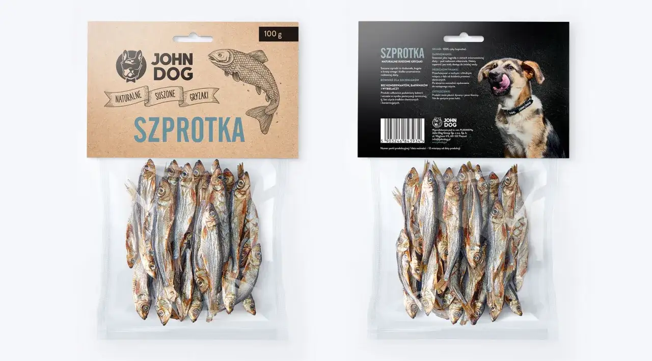 pies jedzący suszone szprotki